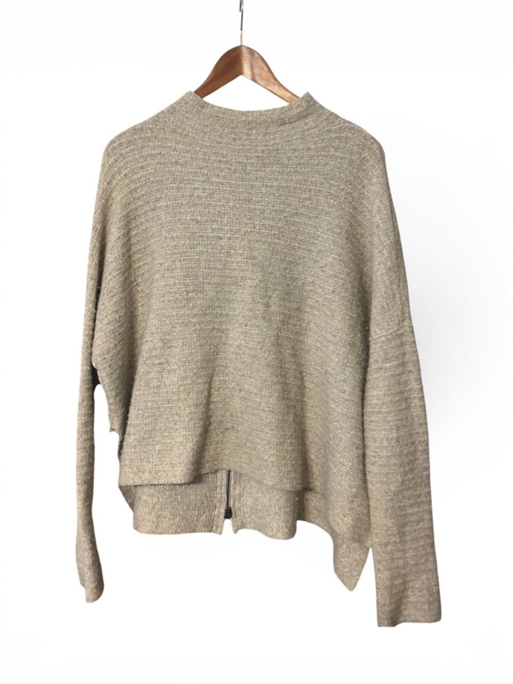 Free People Artic Fox Mock Neck Sweater featuring an exposed back zipper.